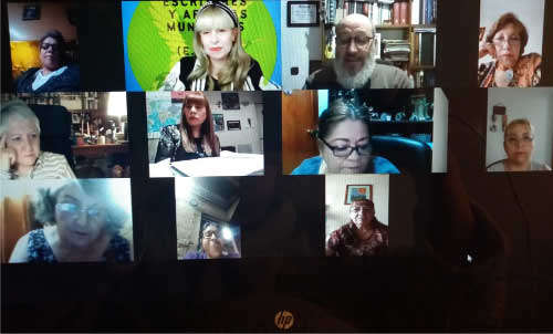 Impartiendo un taller de Rima Jotabé en Escritores y Artistas Mundiales.