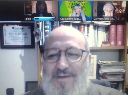 Impartiendo un taller de Rima Jotabé en Escritores y Artistas Mundiales.